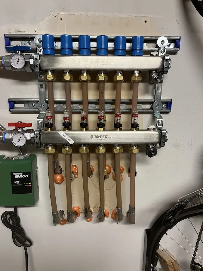 Plumber performing Water Heater Repair at a residential property in Charleston